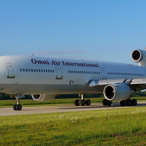 Omni Air Intrenational (Омни Эйр Интернешнл) Самолет 1